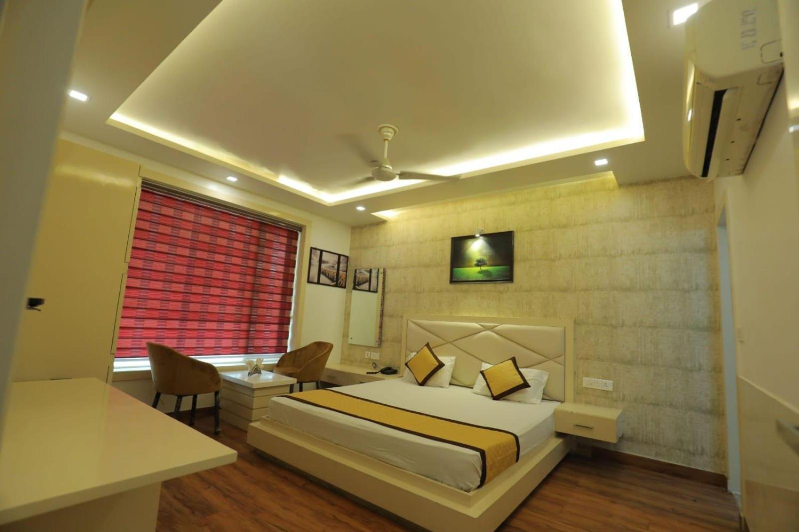 Hotel Red Carpet Tājganj Rom bilde